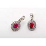 A Pair of Earrings, 500/1000 platinum, set with 2 oval cut rubies, 2 square cut diamonds with an