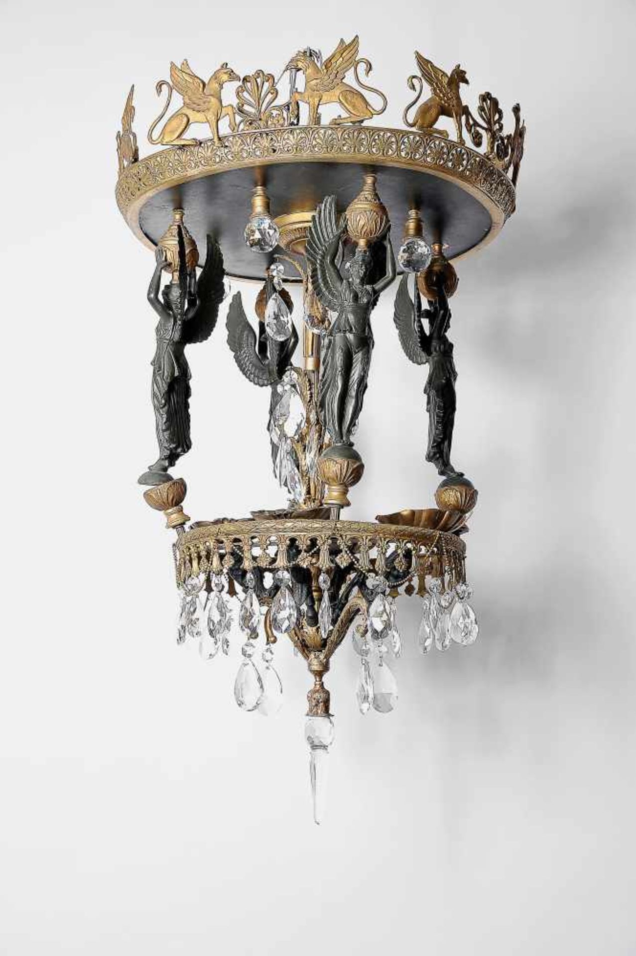 A Four-light Pendant Lamp, Empire manner, gilt and patinated bronze "Winged figures", glass