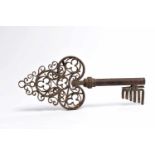 A Big Key, wrought iron, European, 17th C., wear on the iron, Dim. - 44 cm- - -20.00 % buyer's