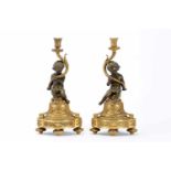 A Pair of Candlesticks "Putti", Louis XV style, patiné bronze and gilt bronze, French, 19th C., Dim.