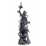 An Oriental Deity and Stork, bronze sculpture, Chinese, 19th C., Dim. - 35 cm- - -20.00 % buyer's