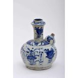 A Kendi, Chinese export porcelain (Kraak), blue decoration "Flowers", small restoration on the