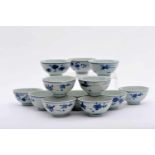 A Set of Twelve Bowls, Chinese export porcelain, blue decoration "Flowers", wear on the glaze caused