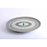 An Oval Platter with Grid, Chinese export porcelain, polychrome and gilt decoration with the coat of