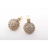 A Pair of Earrings, gold and platinum, set with 46 antique brilliant cut diamonds with an