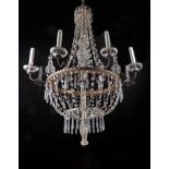 An Eight-light Bag Chandelier, metal structure, glass filaments and pendants, 19th C., minor