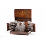 A Liquor Box, Victorian (1837-1901), wood coated with Brazilian rosewood and satinwood marquetry,