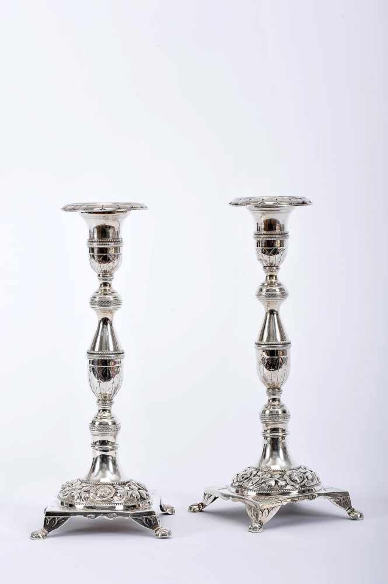 A Pair of Candlesticks, romantic, 833/1000 silver, engraved decoration en relief "Flowers",