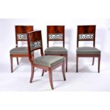 A Set of Four Chairs, Empire style, mahogany and burr-mahogany, carved and pierced back splats,