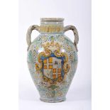 A Large Vase with two Handles, faience probably from Talavera, polychrome decoration with the coat