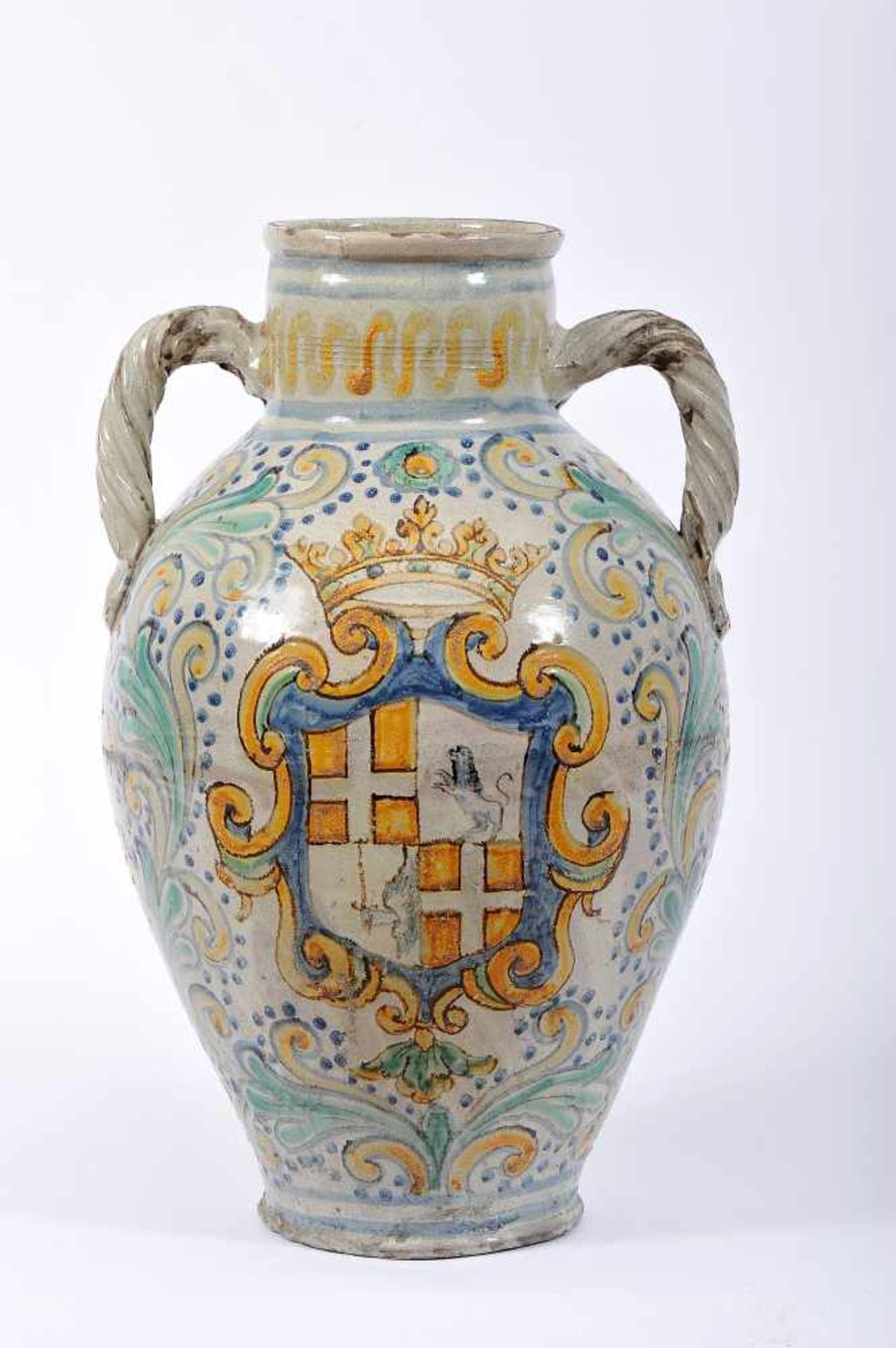 A Large Vase with two Handles, faience probably from Talavera, polychrome decoration with the coat
