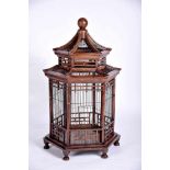 A "Pagoda" Cage, darkened wood, metal grid and tray, European, 19th/20th C., minor defects, Dim. -