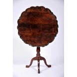 A Tripod Table, Brazilian mahogany and walnut, scalloped tilt-top, English, 18th C., traces of