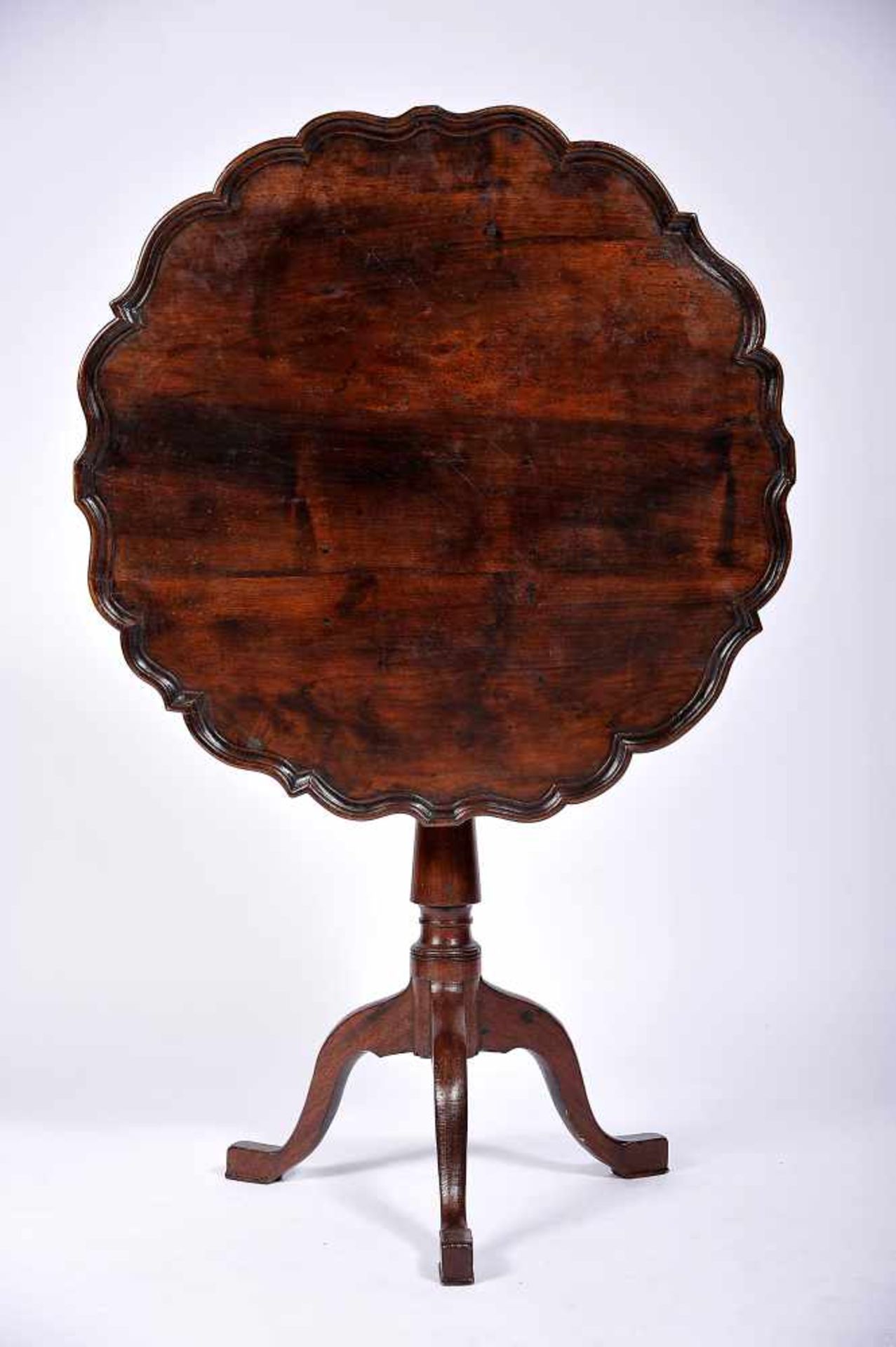 A Tripod Table, Brazilian mahogany and walnut, scalloped tilt-top, English, 18th C., traces of