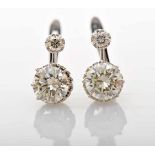 A Pair of Earrings, 500/1000 platinum, set with 2 brilliant cut diamonds with an approximate