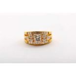 A Ring, 800/1000 gold, set with 6 navette cut diamonds with an approximate weight of 0.60 ct., 18