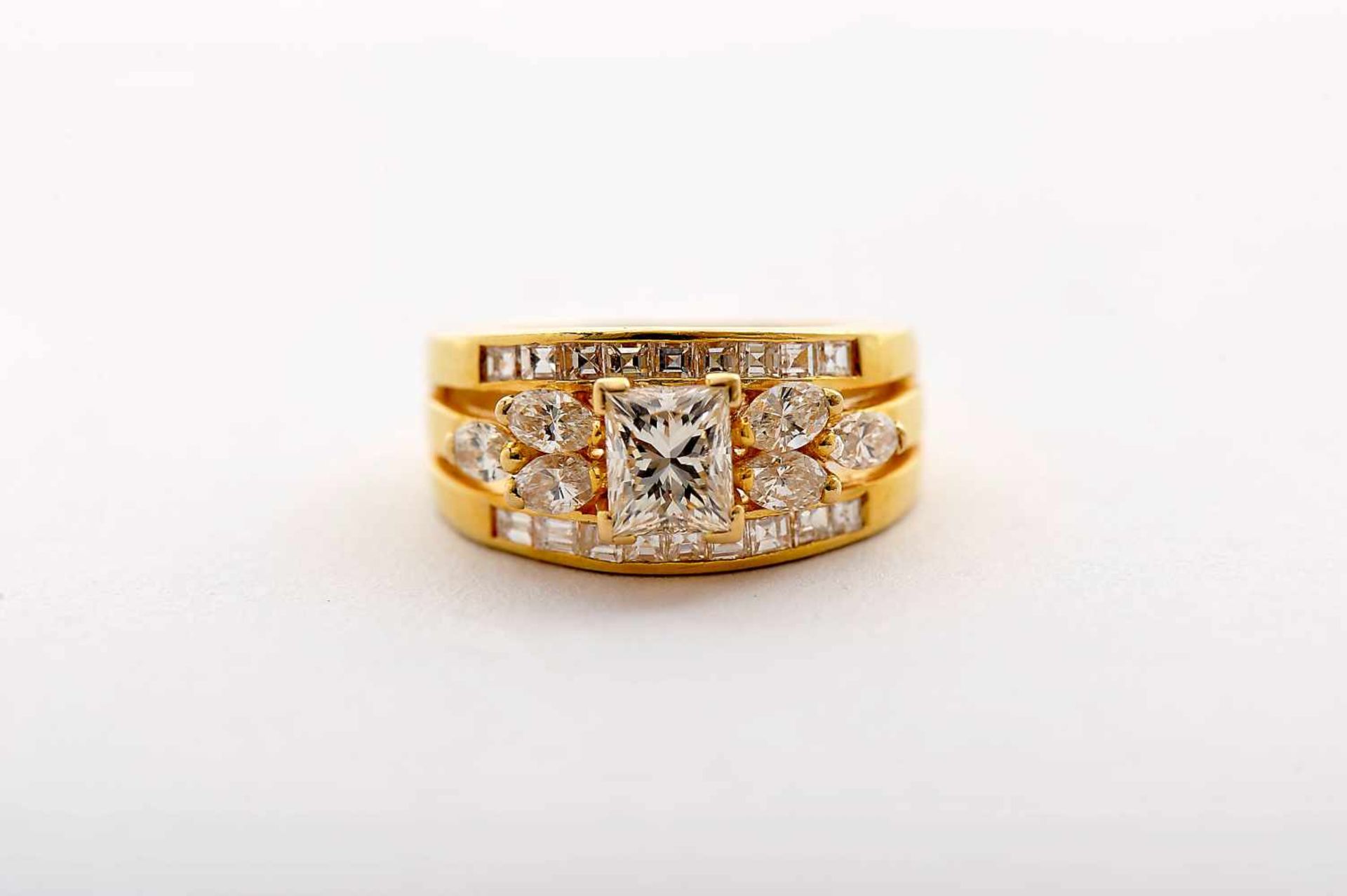 A Ring, 800/1000 gold, set with 6 navette cut diamonds with an approximate weight of 0.60 ct., 18
