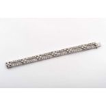 A Bracelet, 500/1000 platinum, set with 138 8/8 and brilliant cut diamonds with an approximate total