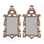 A Pair of Mirrors, George II (1726-1760), carved, pierced and gilt wood frames, English, faults on