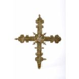 A Processional Cross, gilt bronze, scalloped engraved decoration en relief "Our Lady with the