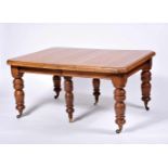 A Dining Table, Victorian (1837-1901), oak, turned legs, feet with casters, four extension boards,