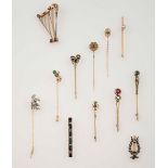 Group of gold and gem-set brooches - . -