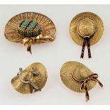 Four gold brooches - montature in oro giallo ed oro bianco 750/1000 con smalti, [...]