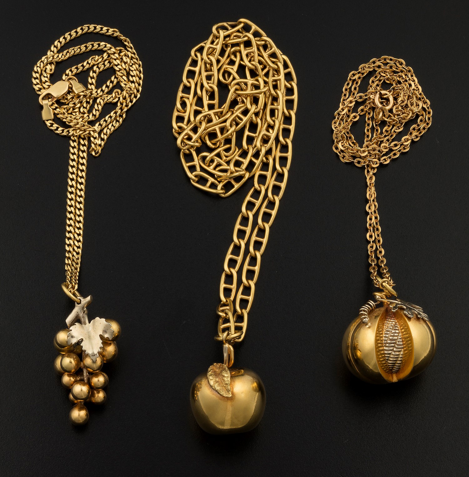 Three gold pendants - montature in oro giallo 750/1000 -