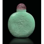 A jadeite snuff bottle, China, Qing, 1800s - Green jadeite with a pink lid, engraved [...]