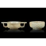 Two white jade bowls, China, Qing Dynasty - Qianlong period (1736-1796). 3x11.5cm and [...]