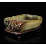 A jade bowl, China, Qing Dynasty, Qianlong period - Yellow jade and russet with an [...]