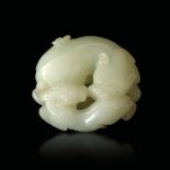 A white jade group, China, Qing Dynasty - Qianlong period (1736-1796). Diam 5cm -