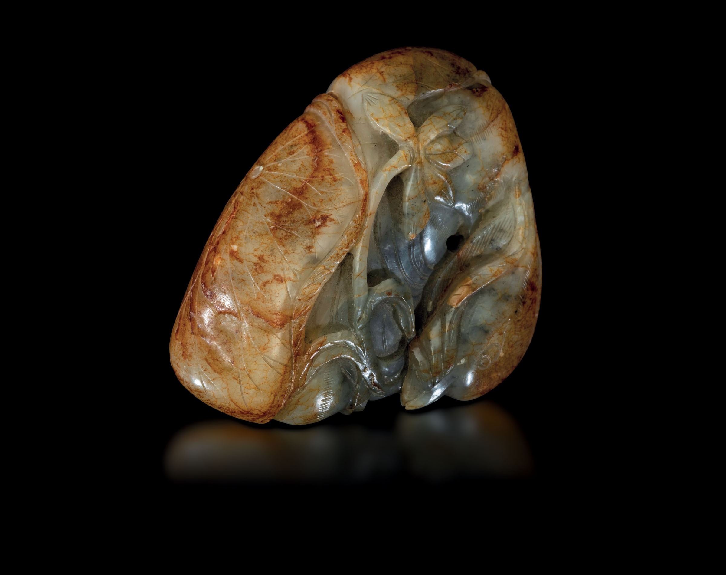A jade and russet group, China, Qing Dynasty - Qianlong period (1736-1796). 7.5x9.5cm -
