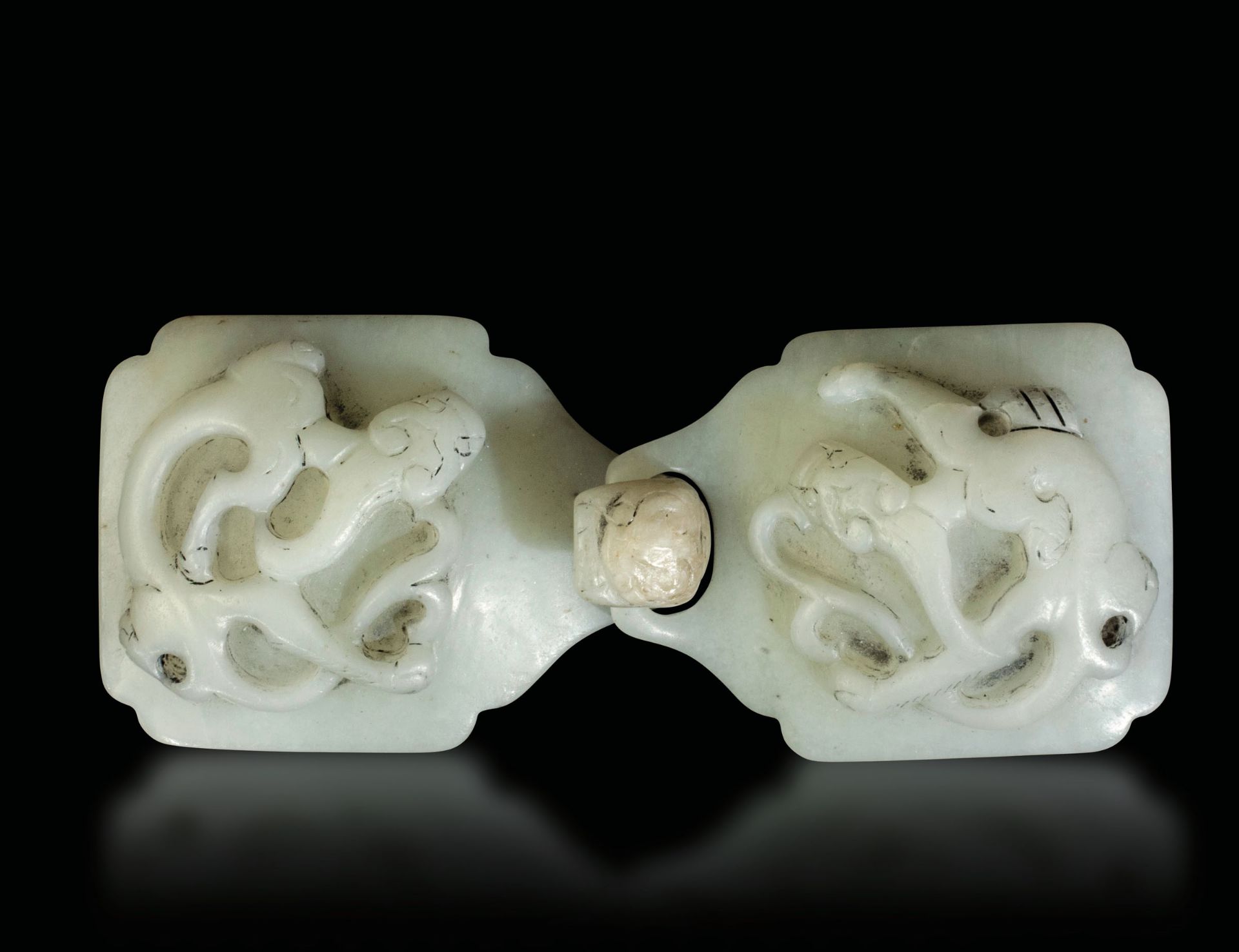 A white jade clasp, China, Qing Dynasty - Qianlong period (1736-1796). 4x10cm -