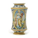 Albarello Faenza, 1550-1570 circa, - Maiolica. Altezza cm 25. Sbeccature restaurate [...]