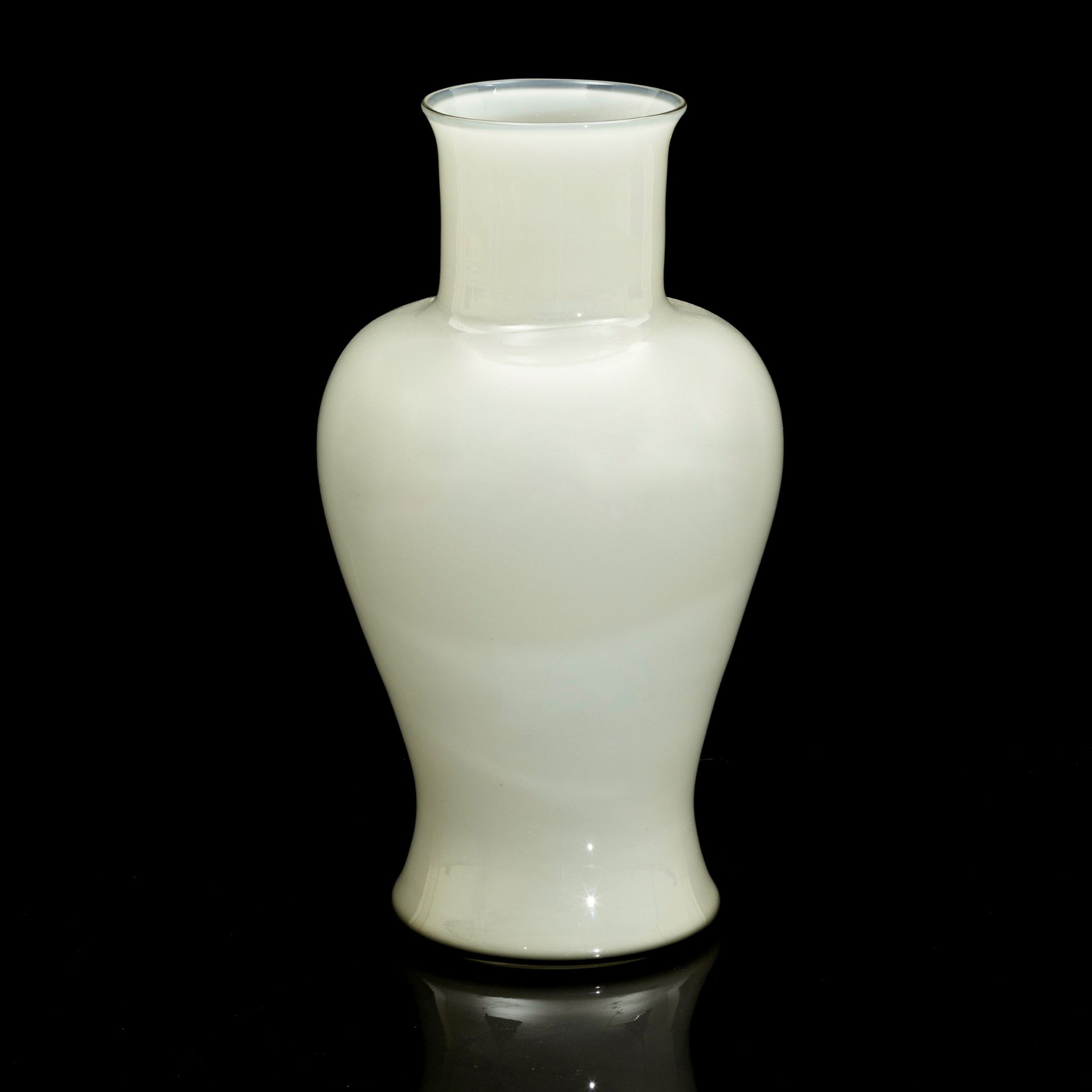 Venini, Murano, 1950 ca - A baluster vase in opaline cased grey glass. Acid-etched [...]