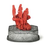 A coral group on a silver filigree base, Italy, 1800s - Prob. Sicily. Coral 109gr, [...]