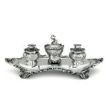 A silver inkstand, London, 1847 - Molten, embossed and chiselled silver. [...]