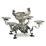 A silver épergne, London, 1758 - Molten, embossed and partially gilt silver. [...]