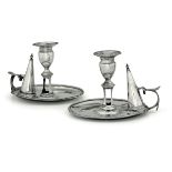 Two silver candle holders, London, 1803 and 1780 - Molten, embossed and chiselled [...]