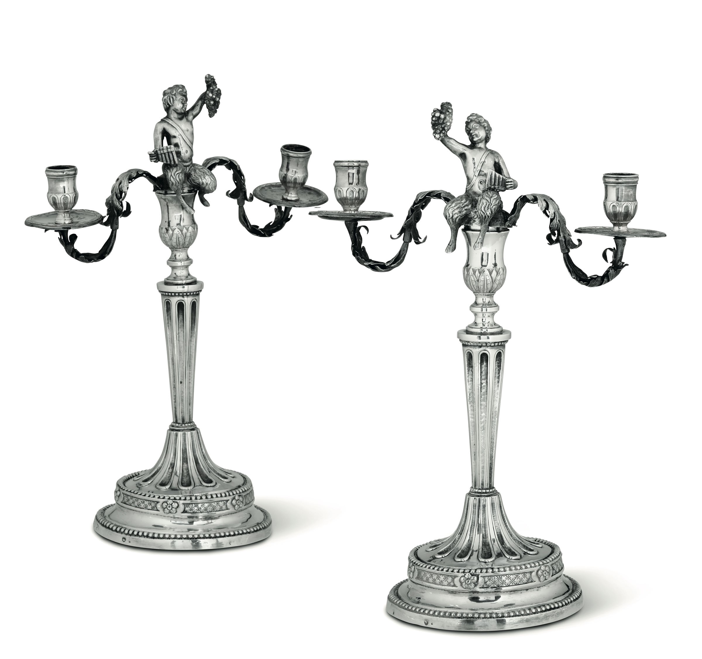 Two silver candle holders, Genoa, 1797 - Molten, embossed and chiselled silver. [...]