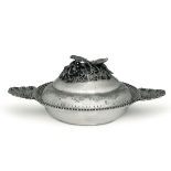 A silver serving dish, Europe, 1900s - Molten, embossed and chiselled silver. Marks [...]