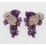 Pair of amethyst, rock crystal and diamond clips - montatura in oro bianco 750/1000. [...]