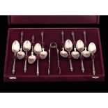 A set of teaspoons, France, 1900s - - 12 teaspoons and sugar tongs in molten and [...]