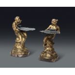 Coppia di alzatine con figure di Tritone e Sirena in bronzo dorato e conchiglia in [...]