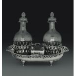 A silver cruet stand, Germany, 1700s - - Molten, embossed, perforated and chiselled [...]