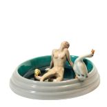 Lenci, Turin, 1930ca - A centrepiece shaped as an oval tub with a woman lying and two [...]