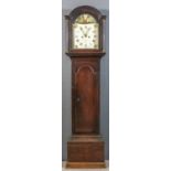 A 19th Century oak longcase clock, the 12ins arched painted dial with Roman numerals, subsidiary