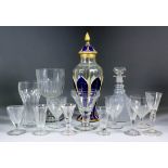 A quantity of primarily 19th Century table glass, including - panel cut baluster-shaped vase and