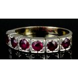 A 18ct gold mounted six stone ruby ring (approximate total ruby weight 1.5ct) (size J - gross weight